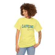 a woman wearing a yellow caffeine t - shirt