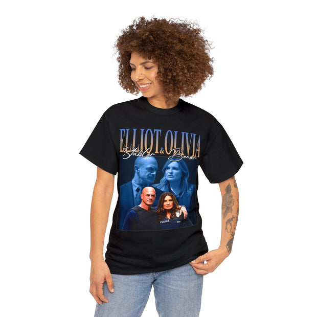 a woman wearing a black t - shirt with a picture of two women on it