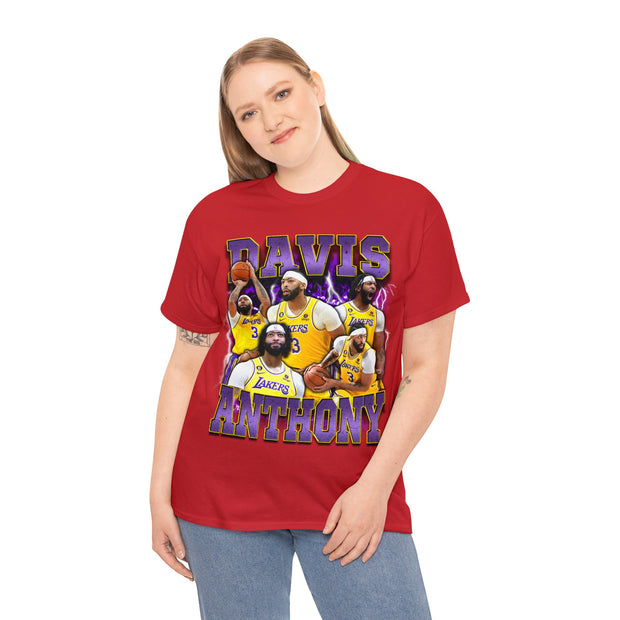 a woman wearing a red shirt with a picture of a group of basketball players on