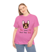 a woman wearing a pink shirt with a dog on it