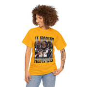 a woman wearing a yellow t - shirt with a picture of a basketball player