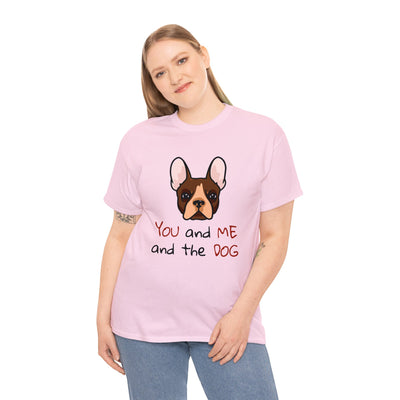 a woman wearing a pink shirt with a dog on it