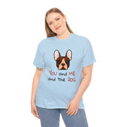 a woman wearing a blue shirt with a dog on it