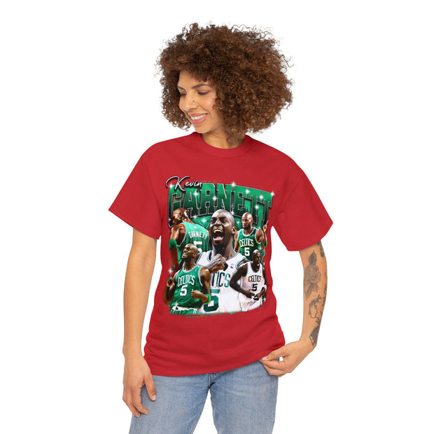 a woman wearing a red t - shirt with a picture of a basketball player