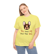 a woman wearing a yellow shirt with a dog on it