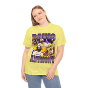 a woman wearing a yellow t - shirt with a picture of a basketball team