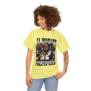 a woman wearing a yellow t - shirt with a picture of a basketball player