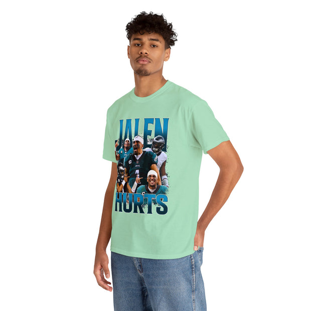 a man wearing a green t - shirt with a picture of football players on it