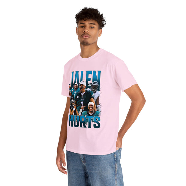 a man wearing a pink t - shirt with a picture of a football team