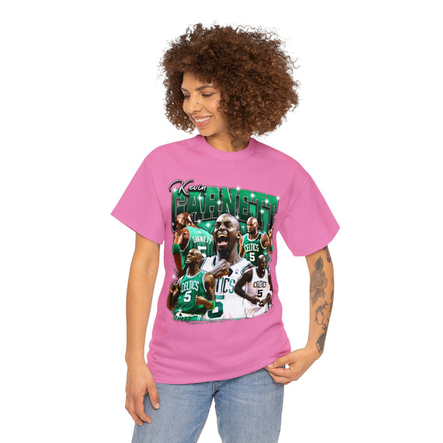 a woman wearing a pink t - shirt with a picture of a basketball player