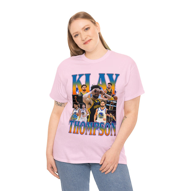 a woman wearing a pink t - shirt with a photo of a basketball player